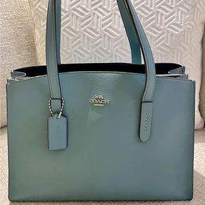 Coach Charlie Carryall